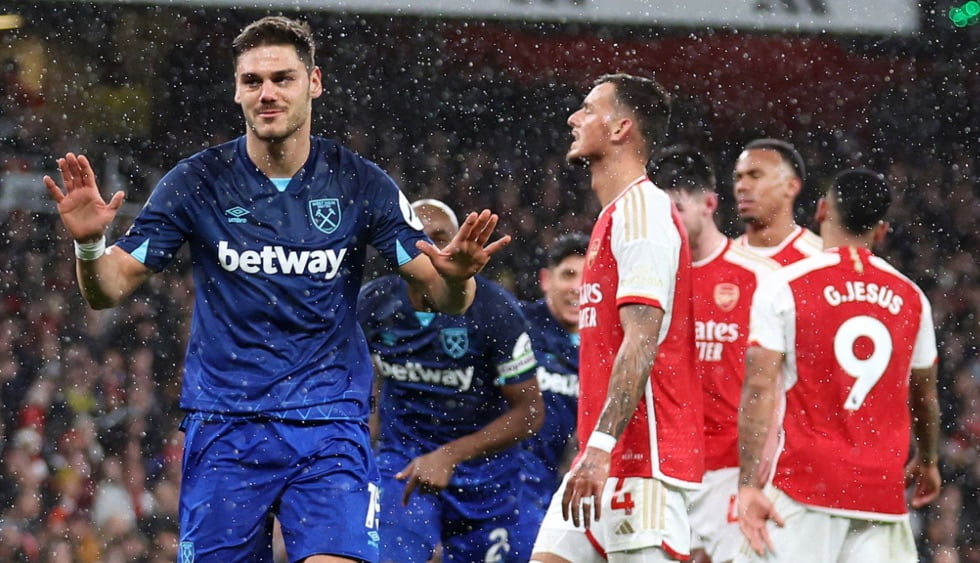 Konstantinos Mavropanos celebrates in muted fashion after scoring against his former club Arsenal