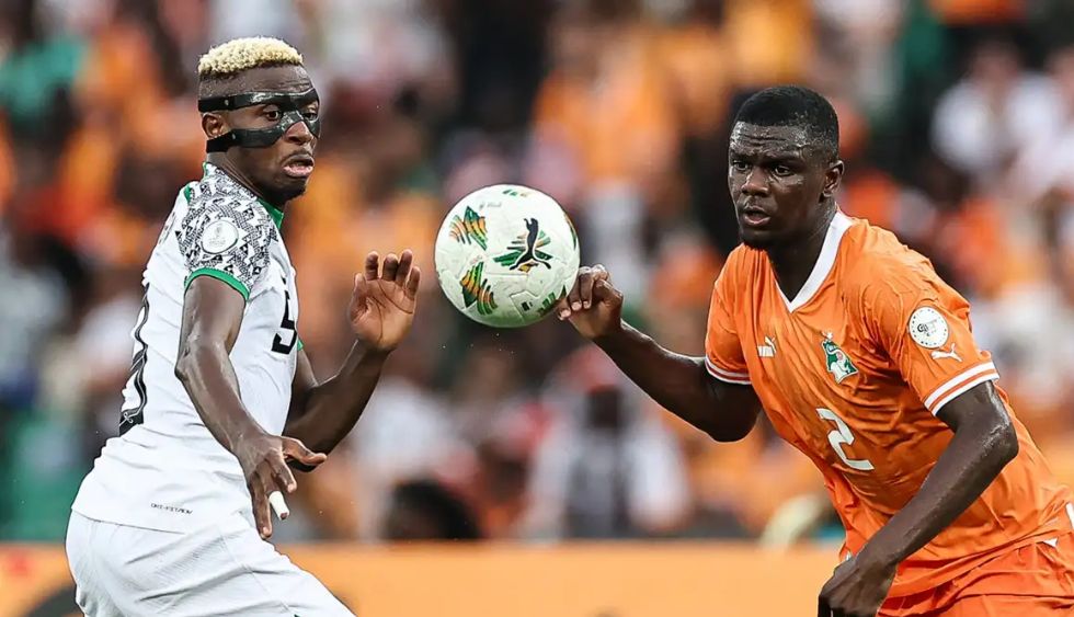 Ivory Coast and Nigeria football players