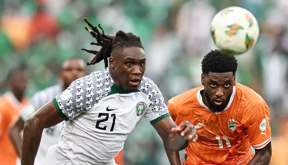 Ivory Coast and Nigeria football players